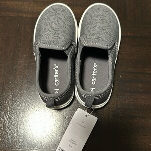 Carters brand new with tags size 9 toddler Dino slip ons!